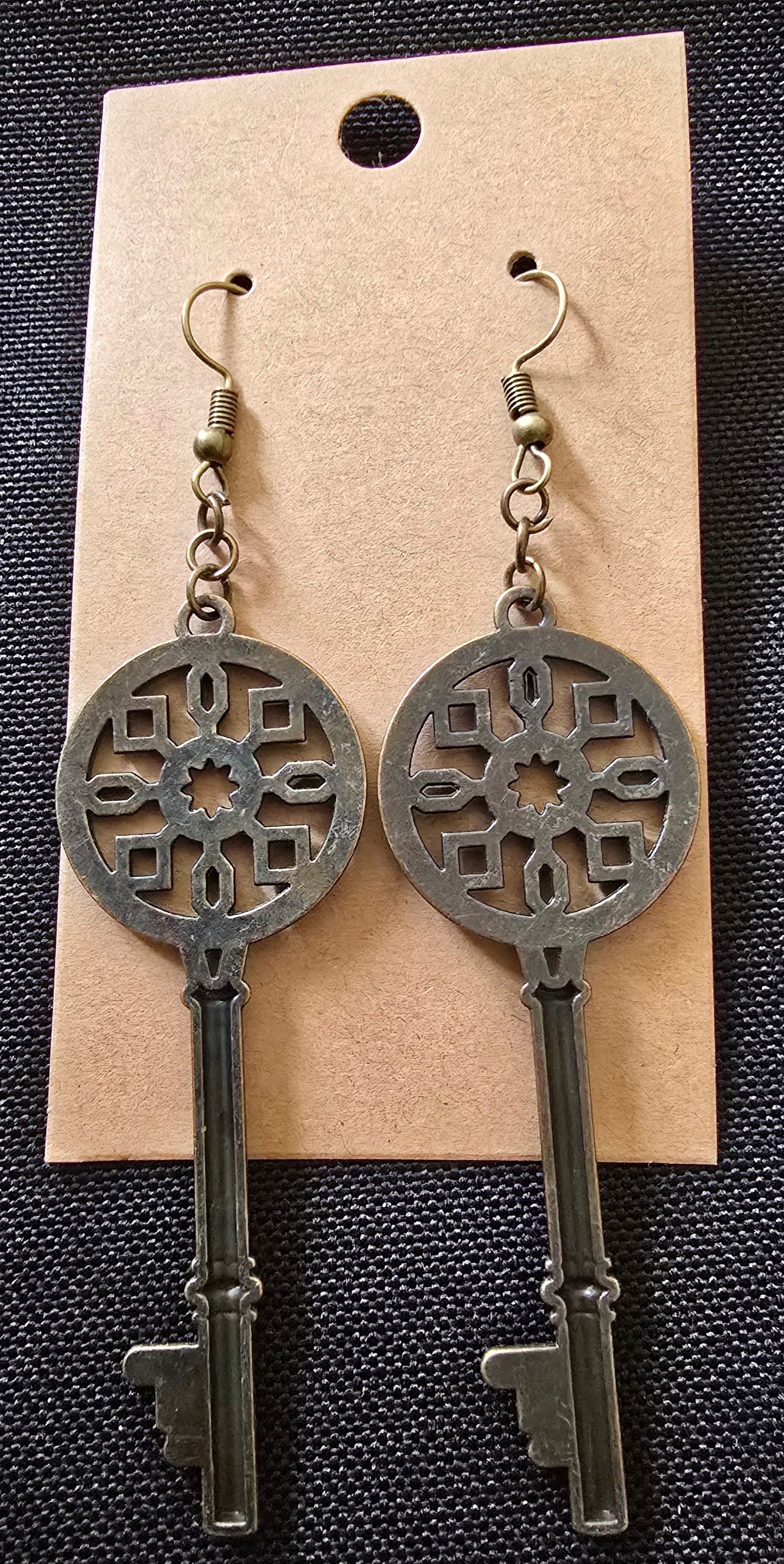 Bronze key earrings