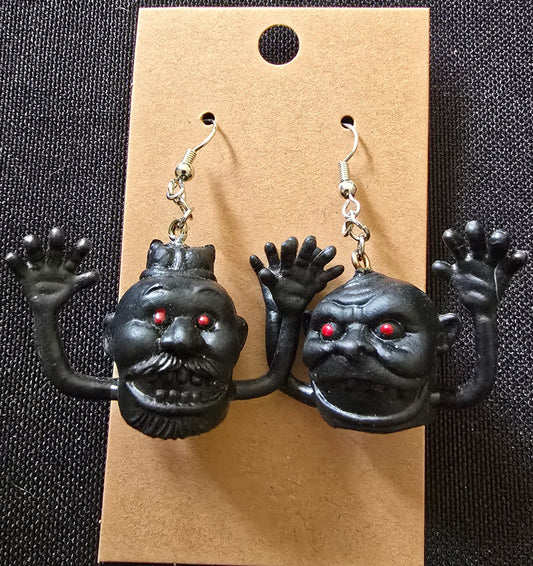 Finger monster earrings